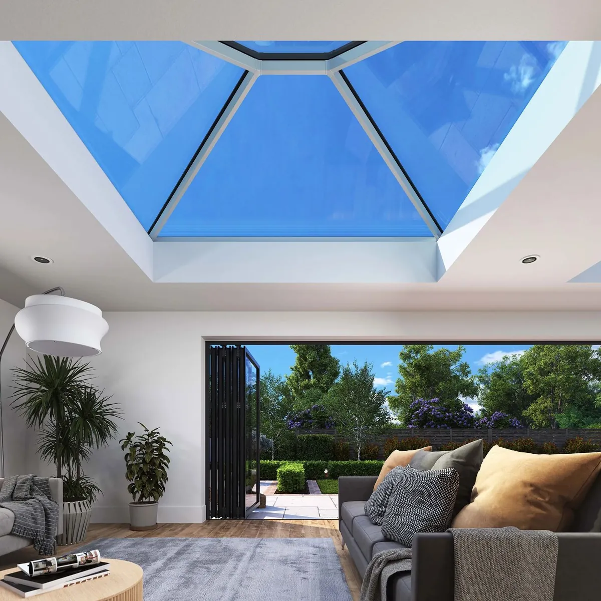 Korniche roof lantern above a living space with bifold doors onto the garden